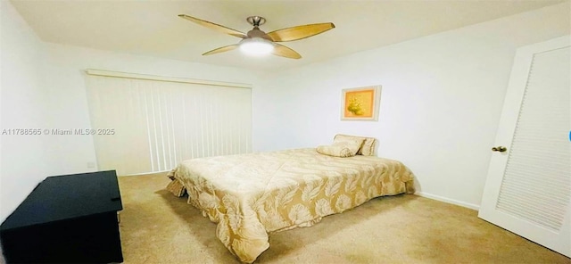 497 W Tilford W Unit W, Deerfield Beach, FL 33442 - carpeted bedroom featuring a closet, baseboards, and ceiling fan