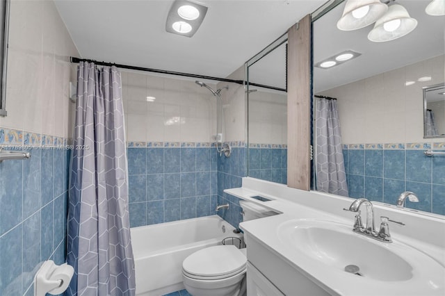 6900 Bay Dr Unit 11F, Miami Beach, FL 33141 - bathroom with tile walls, vanity, toilet, and shower / tub combo with curtain