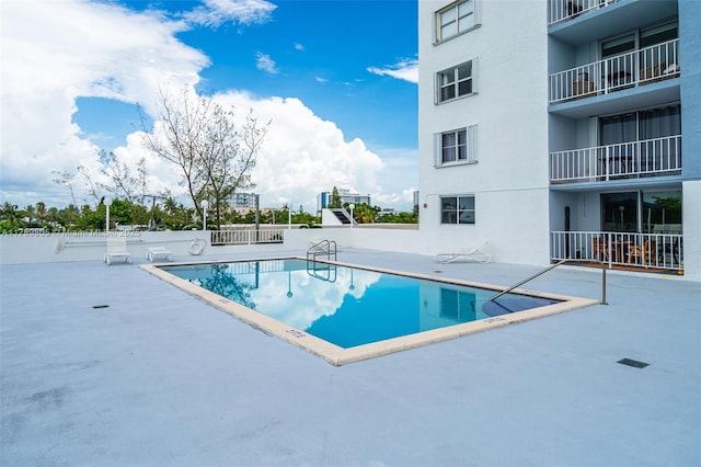 6900 Bay Dr Unit 11F, Miami Beach, FL 33141 - pool with fence and a patio area