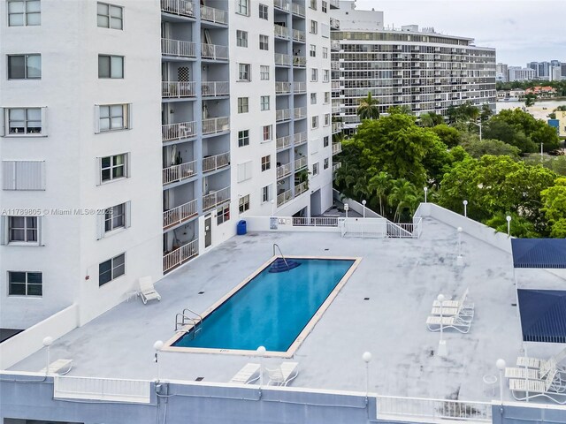 6900 Bay Dr Unit 11F, Miami Beach, FL 33141 - community pool with a patio, fence, and a city view