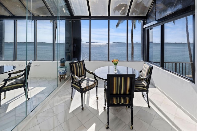 520 Brickell Key Dr Unit A201, Miami, FL 33131 - sunroom featuring a water view