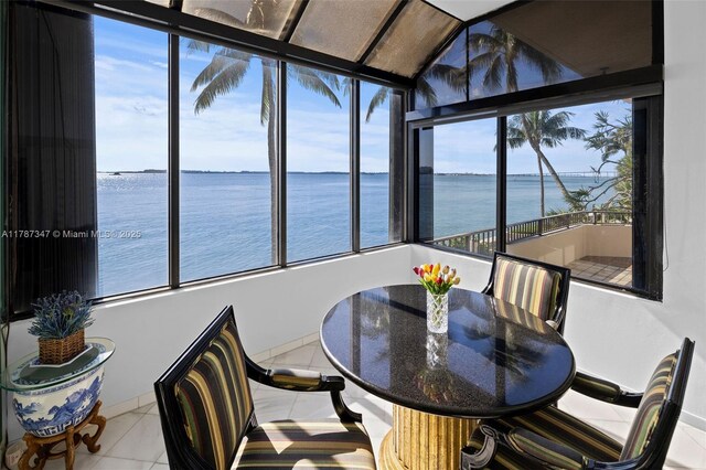 520 Brickell Key Dr Unit A201, Miami, FL 33131 - sunroom / solarium featuring a water view
