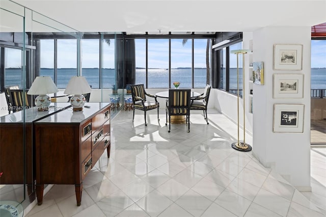 520 Brickell Key Dr Unit A201, Miami, FL 33131 - interior space with light tile patterned flooring and a water view