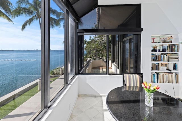 520 Brickell Key Dr Unit A201, Miami, FL 33131 - sunroom featuring a water view