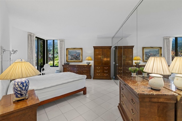 520 Brickell Key Dr Unit A201, Miami, FL 33131 - bedroom featuring light tile patterned floors