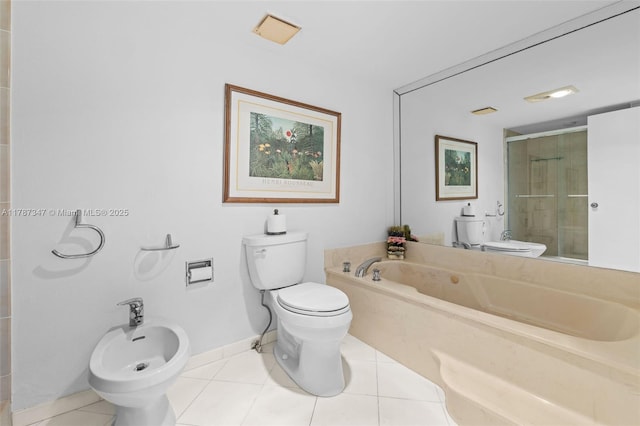 520 Brickell Key Dr Unit A201, Miami, FL 33131 - bathroom featuring tile patterned floors, a bidet, and toilet