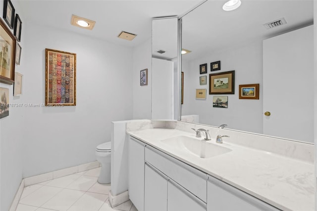 520 Brickell Key Dr Unit A201, Miami, FL 33131 - bathroom with vanity, baseboards, toilet, tile patterned flooring, and visible vents