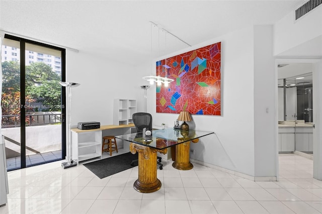 520 Brickell Key Dr Unit A201, Miami, FL 33131 - tiled office with baseboards, visible vents, and floor to ceiling windows