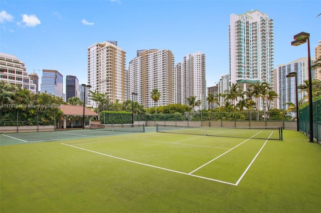 520 Brickell Key Dr Unit A201, Miami, FL 33131 - view of sport court featuring fence and a view of city