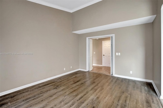 129 Chelsea Ln, Plantation, FL 33324 - spare room featuring baseboards, crown molding, and wood finished floors