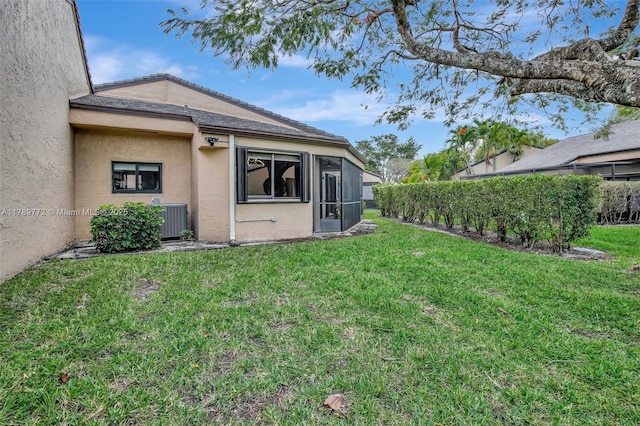 129 Chelsea Ln, Plantation, FL 33324 - view of yard with a sunroom and central AC