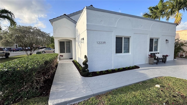 12239 NW 7th St, Miami, FL 33182 - view of front of home with stucco siding