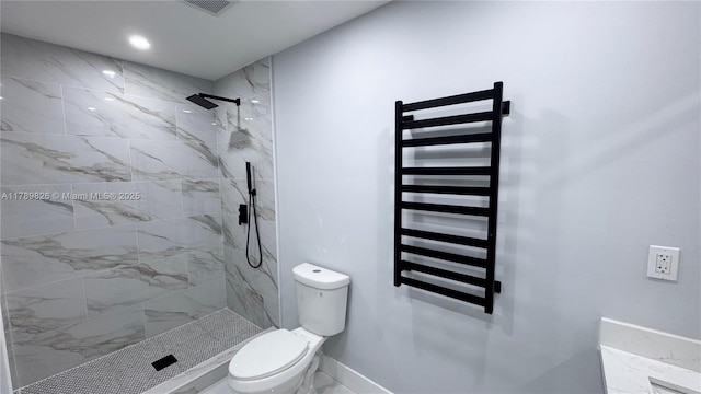 bathroom featuring radiator, visible vents, toilet, baseboards, and tiled shower