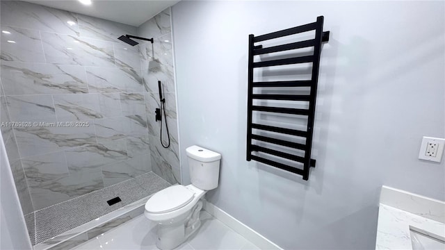 bathroom featuring a tile shower, radiator heating unit, marble finish floor, toilet, and baseboards