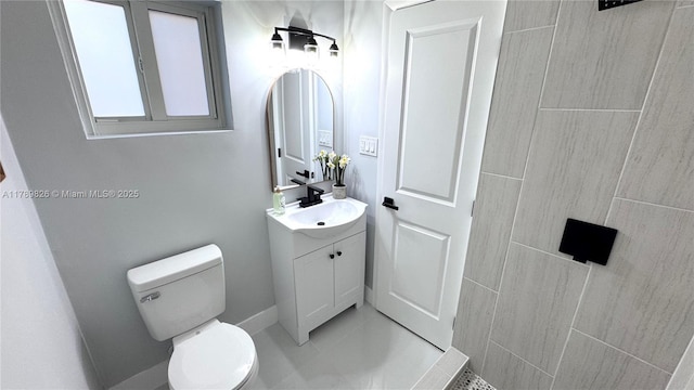 12239 NW 7th St, Miami, FL 33182 - bathroom featuring vanity, toilet, and tile patterned floors