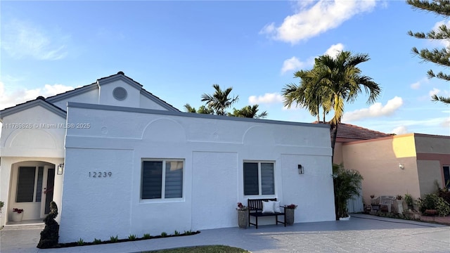 exterior space with stucco siding
