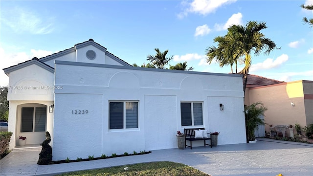 12239 NW 7th St, Miami, FL 33182 - view of front of home featuring stucco siding