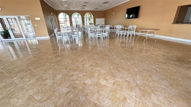 12239 NW 7th St, Miami, FL 33182 - dining space featuring baseboards and french doors