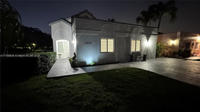 12239 NW 7th St, Miami, FL 33182 - view of front facade with stucco siding