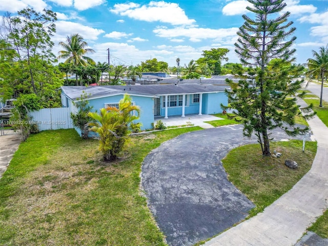11024 SW 51st Ter, Miami, FL 33165 - single story home featuring fence, a front lawn, driveway, and stucco siding