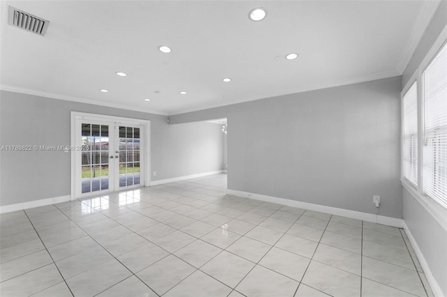 11024 SW 51st Ter, Miami, FL 33165 - empty room featuring ornamental molding, light tile patterned flooring, visible vents, and plenty of natural light