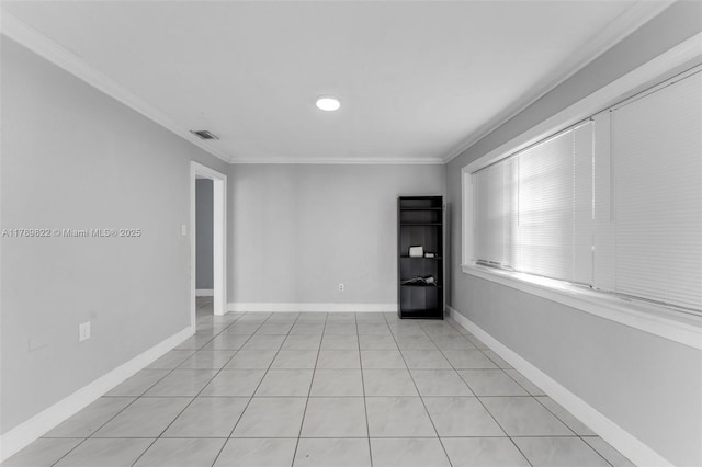 11024 SW 51st Ter, Miami, FL 33165 - spare room featuring light tile patterned flooring, visible vents, baseboards, and ornamental molding