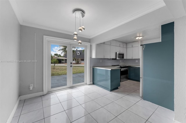 11024 SW 51st Ter, Miami, FL 33165 - kitchen featuring white cabinets, light countertops, crown molding, a peninsula, and appliances with stainless steel finishes