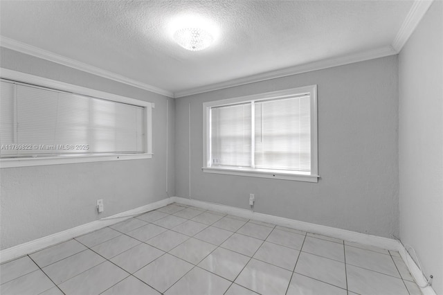 11024 SW 51st Ter, Miami, FL 33165 - empty room featuring baseboards, a textured ceiling, ornamental molding, and light tile patterned flooring