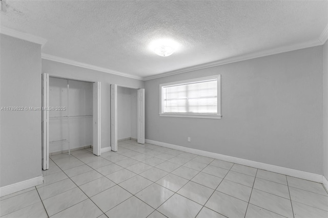 11024 SW 51st Ter, Miami, FL 33165 - unfurnished bedroom with a textured ceiling, multiple closets, baseboards, and ornamental molding