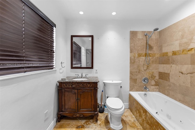 11024 SW 51st Ter, Miami, FL 33165 - bathroom featuring tiled shower / bath combo, baseboards, vanity, and toilet