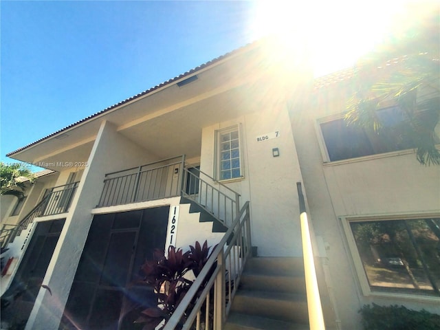 exterior space featuring stucco siding