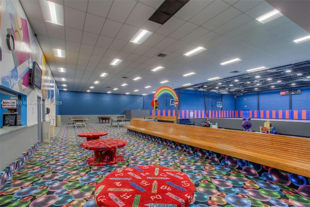 playroom featuring a drop ceiling and visible vents