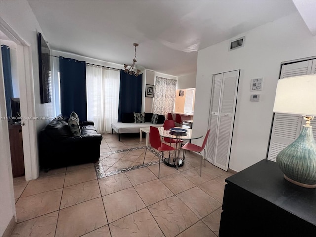 living area featuring visible vents