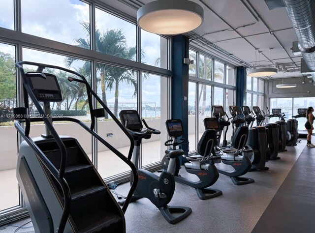 1200 W Ave Unit 1021, Miami Beach, FL 33139 - gym featuring a wall of windows