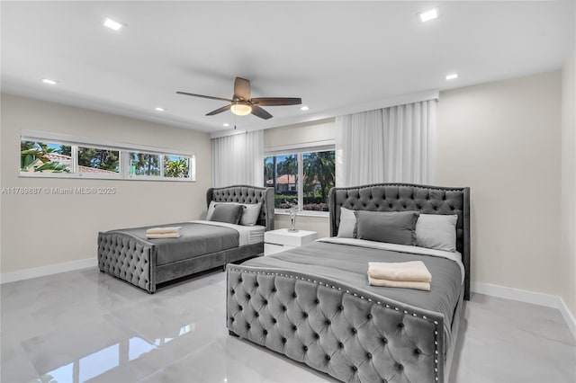 bedroom with recessed lighting, baseboards, and multiple windows