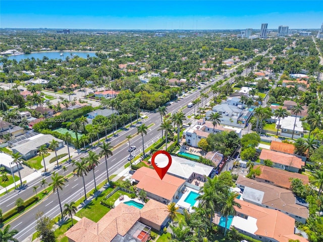 aerial view featuring a water view and a residential view