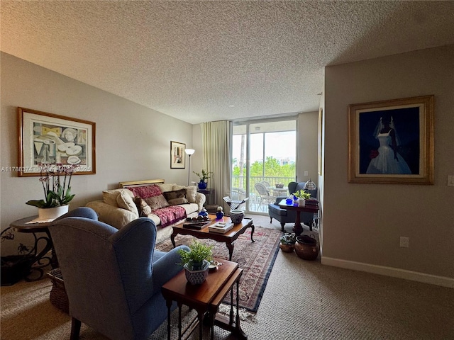 living room with expansive windows, a textured ceiling, carpet flooring, and baseboards