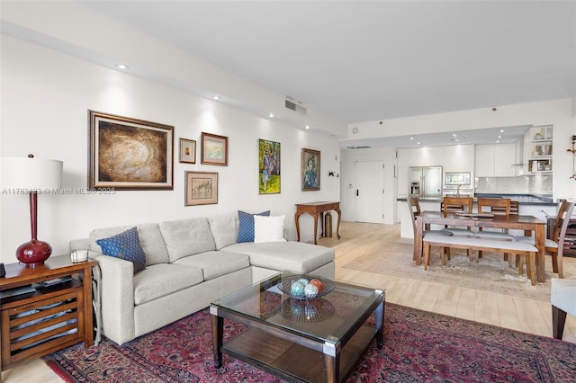 201 Crandon Blvd Unit 333, Key Biscayne, FL 33149 - living room featuring light wood finished floors and recessed lighting