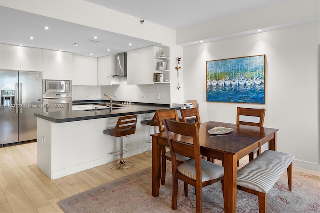 201 Crandon Blvd Unit 333, Key Biscayne, FL 33149 - dining area featuring light wood-type flooring and recessed lighting