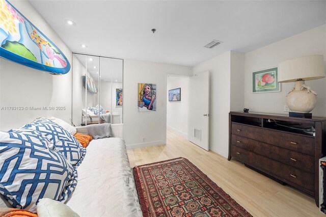 201 Crandon Blvd Unit 333, Key Biscayne, FL 33149 - bedroom featuring light wood-type flooring, recessed lighting, and baseboards