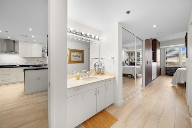 201 Crandon Blvd Unit 333, Key Biscayne, FL 33149 - ensuite bathroom featuring wood finished floors, vanity, and recessed lighting
