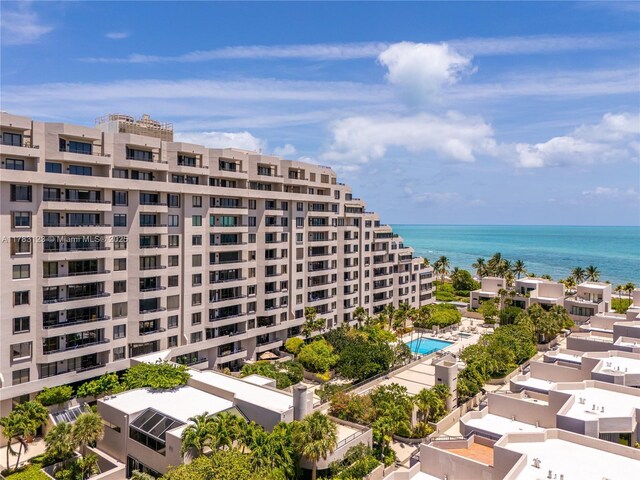 201 Crandon Blvd Unit 333, Key Biscayne, FL 33149 - drone / aerial view of a pool area, apartment complex, and a nearby body of water