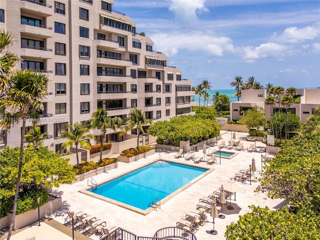 201 Crandon Blvd Unit 333, Key Biscayne, FL 33149 - community pool featuring a water view, a patio area, and fence