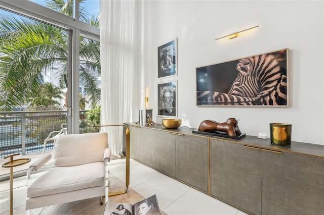sitting room with tile patterned floors