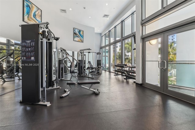 workout area with french doors, visible vents, and recessed lighting