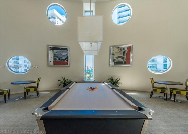 rec room with baseboards, a high ceiling, carpet, and pool table