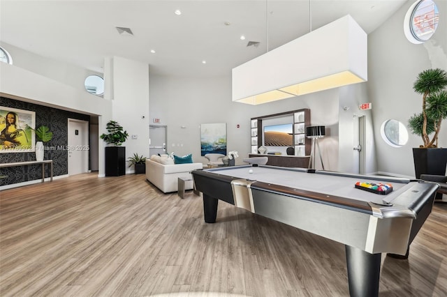 playroom featuring pool table, light wood finished floors, a high ceiling, visible vents, and recessed lighting