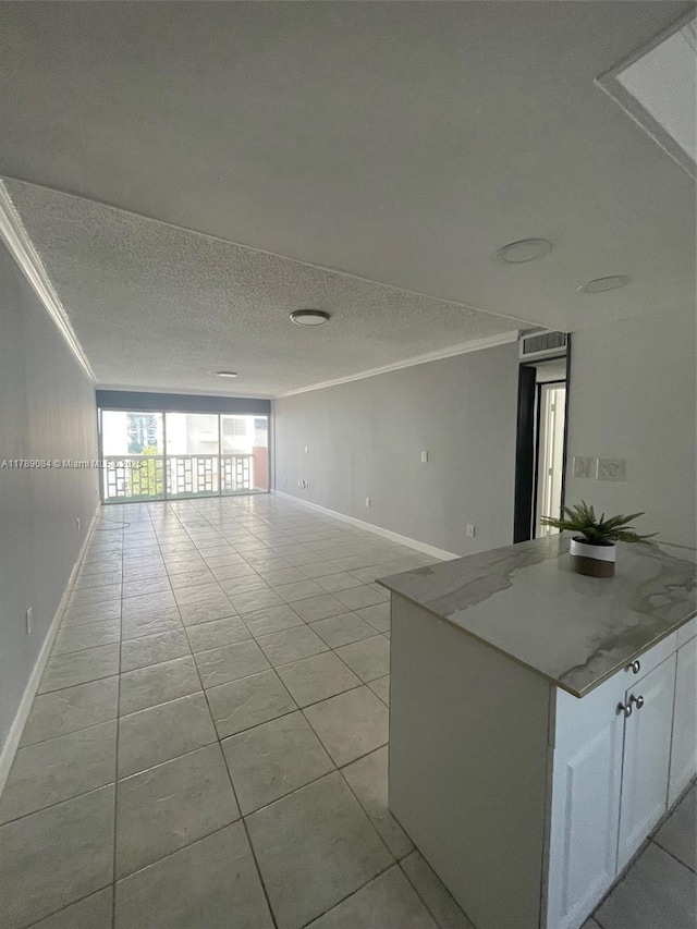 600 NE 25th St Unit 60, Miami, FL 33137 - interior space featuring baseboards, crown molding, and a textured ceiling