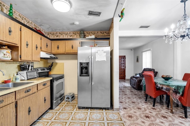 35 SW 60th Ave, Miami, FL 33144 - kitchen with a sink, a chandelier, light floors, appliances with stainless steel finishes, and under cabinet range hood