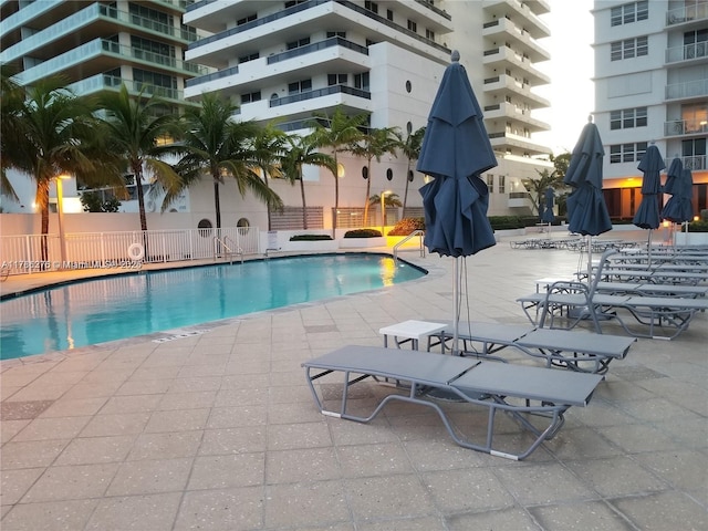 5825 Collins Ave Unit 2D, Miami Beach, FL 33140 - pool with a patio and fence